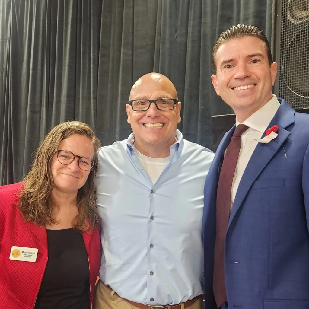 Mary, Sean Stephens, and Eric smiling