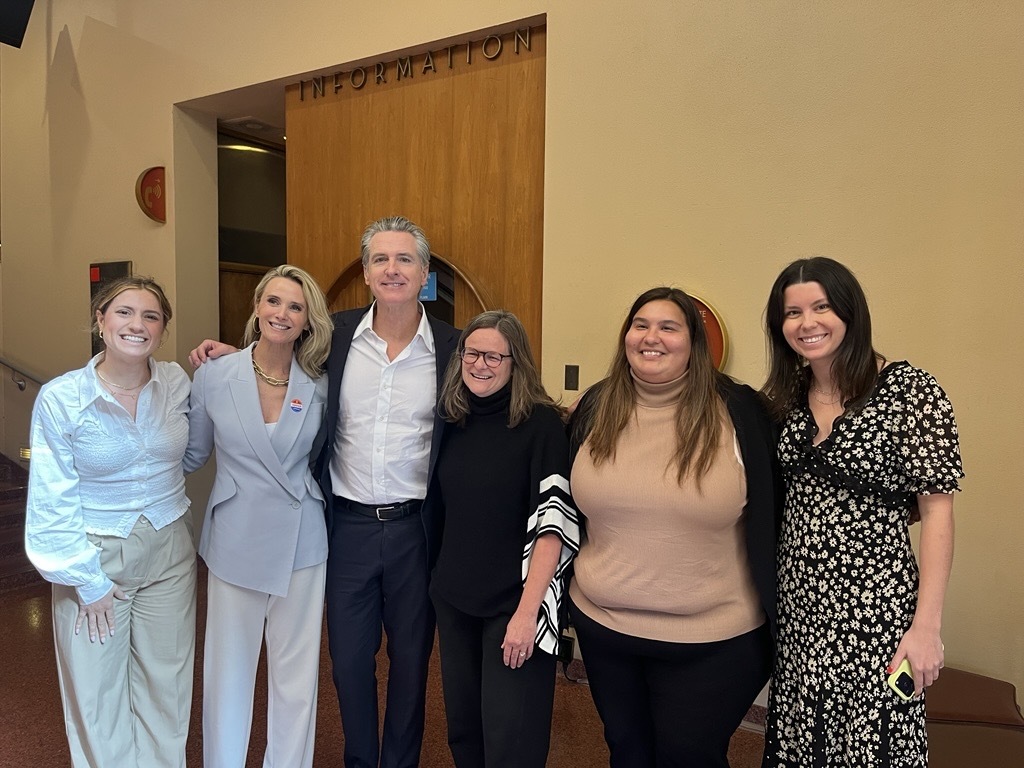 Posing in Civic Center entry with Governor Newsom and First Partner Siebel-Newsom