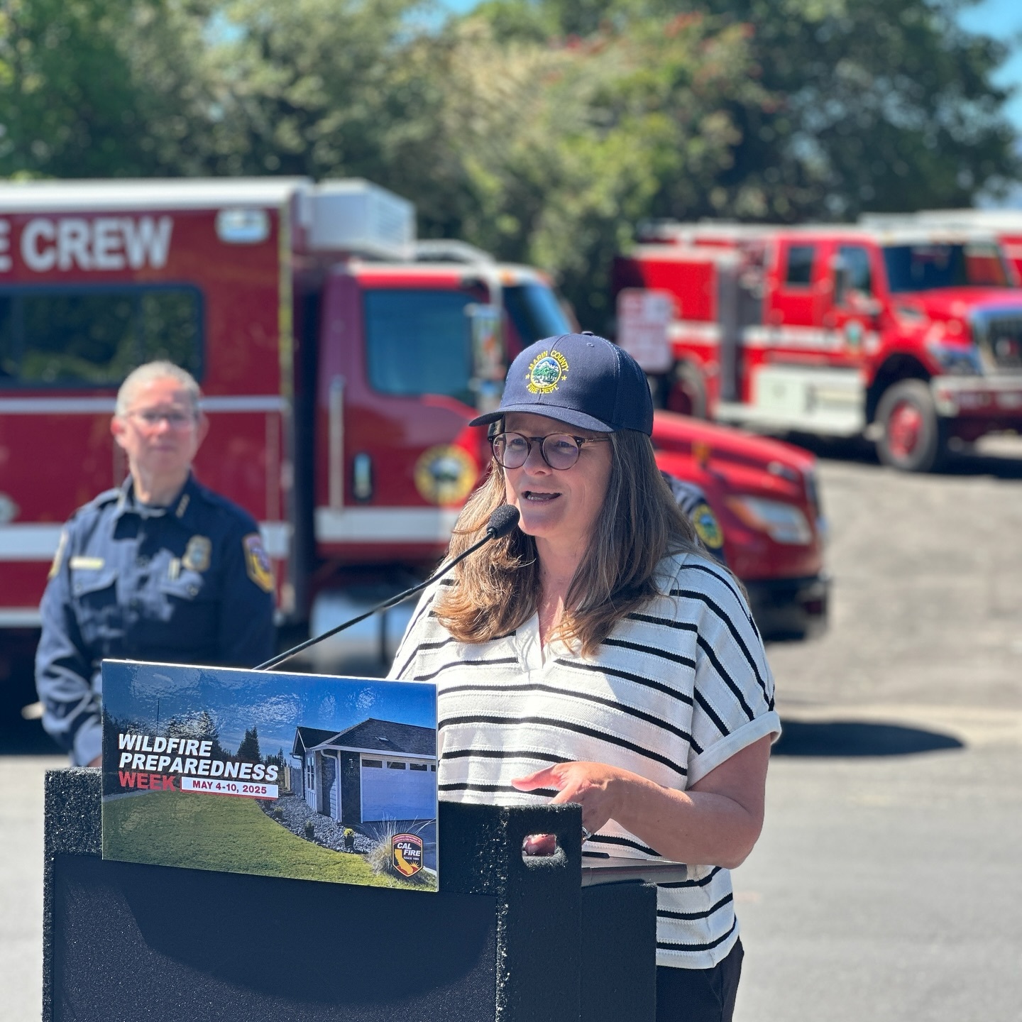 Mary speaking at a podium for Wildfire Preparedness Week