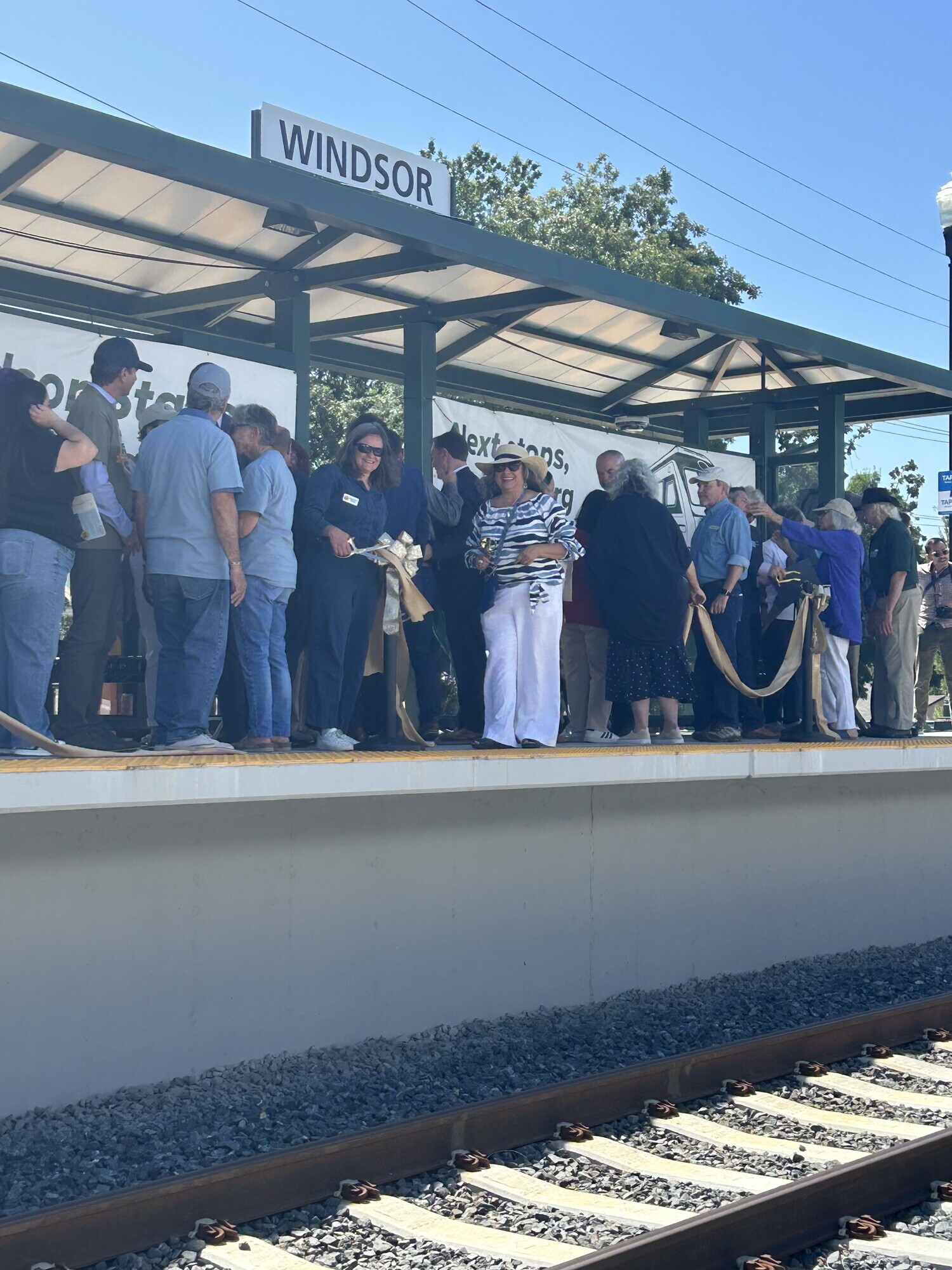 Mary cutting ribbon at SMART Windsor Station