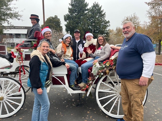 Group photo with santa on a carriage