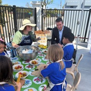 Eric Lucan making salad with kids at the North Bay Children's Center