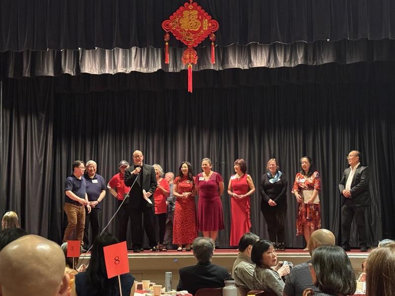 Marin Chinese Cultural Association members gathered on stage 
