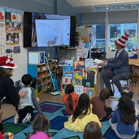 Supervisor Lucan reading to students at Olive School