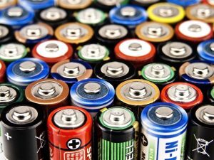 several batteries standing up vertically clustered together