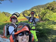 Marin County Park Rangers smiling while working on San Geronimo Commons lands