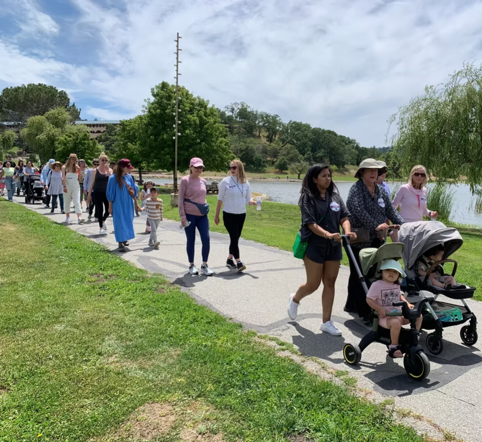 walk for moms in action around the Civic Center lagoon