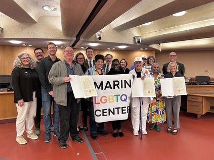 Board of Supervisors Members with community members recognizing Pride Month in the BOS Chambers