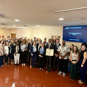 Marin County Board of Supervisors with Brian Washington and other county staff members celebrating his retirement as County Counsel