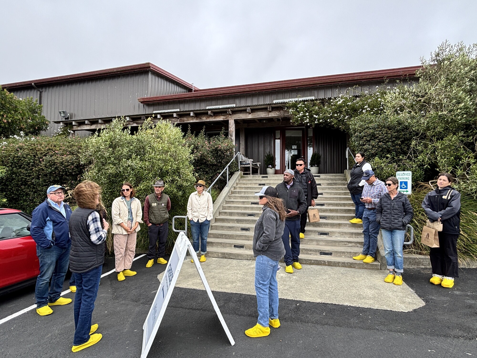 Group standing at pt reyes cheese farmstand