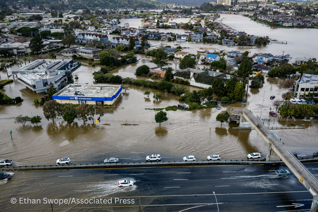 Highway 101 under king tide flood waters