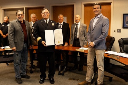 Eric and Novato Fire District staff recognizing the 100th Anniversary of the Novato Fire District