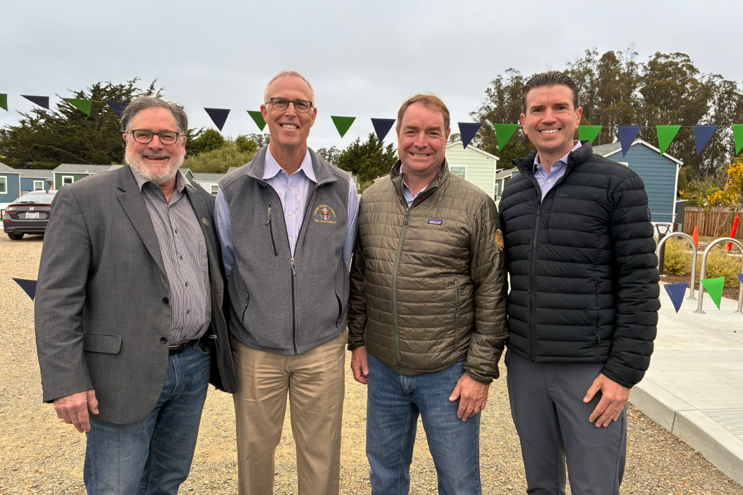 Rodoni, Huffman, Connolly, and Lucan standing together