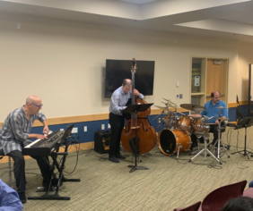 Charged Particles Jazz Band (closeup)