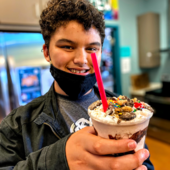 teen enjoying an ice cream.