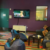 Teens watching a movie.