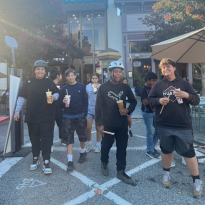 Group of teens drinking boba downtown