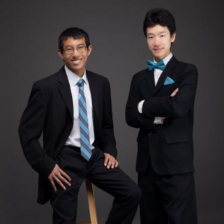 Image of the Hot Dog Duo Performers in Suits