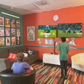 Teens playing Madden on the PS5