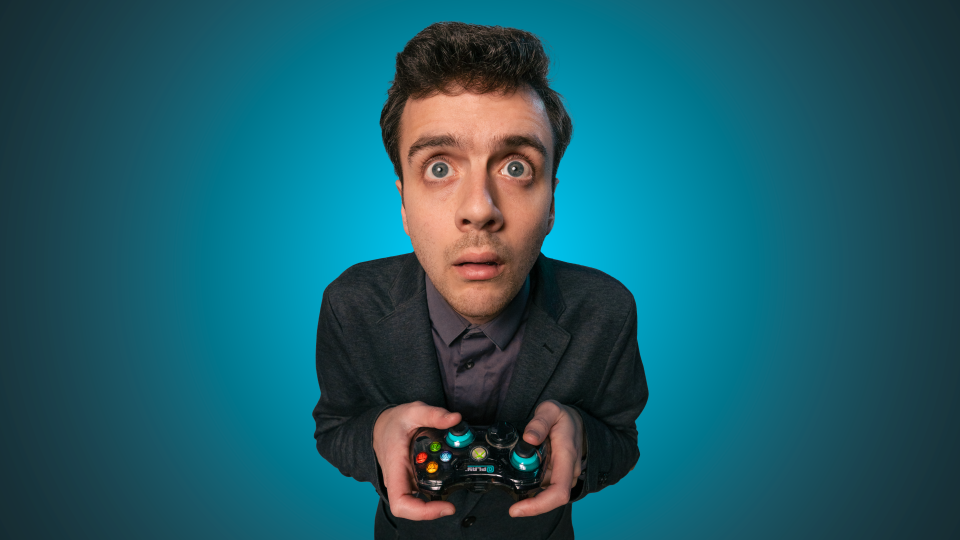 Man With Video Game Controller Looking Up