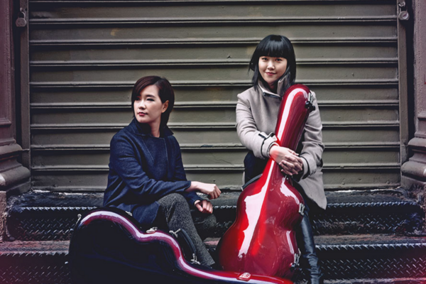 Picture of Beijing Guitar Duo Holding Guitar Cases