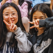 Two teen girls smiling