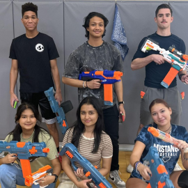 teens holding nerf blasters