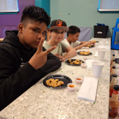 teens eating in the kitchen