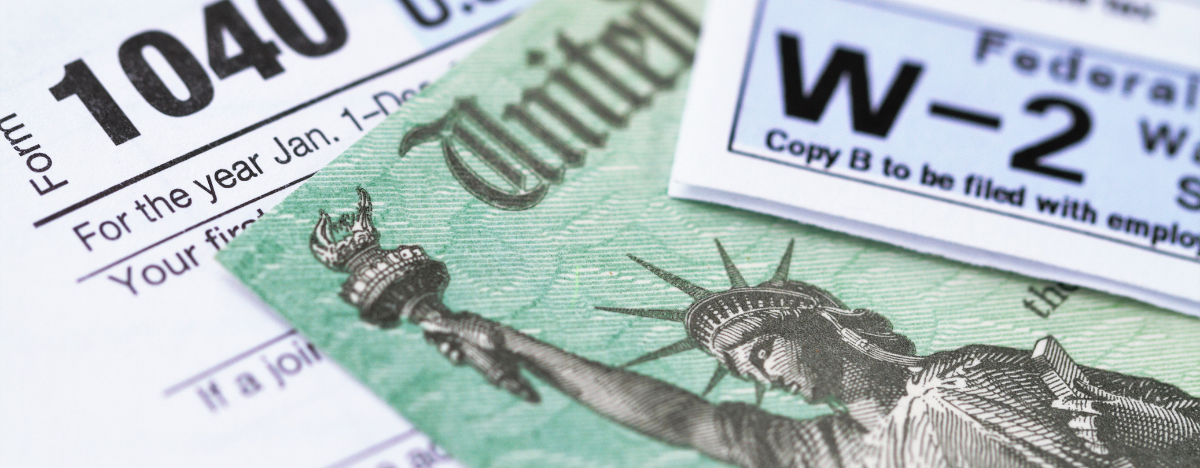 Photo of tax documents, including 1040 and W-2 forms