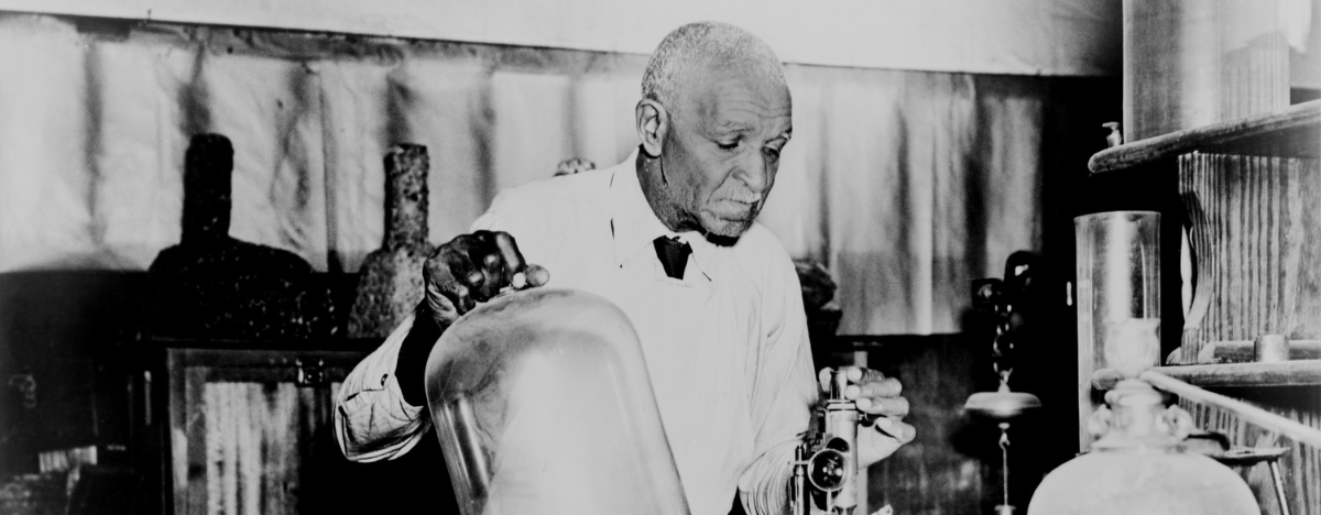 George Washington Carver in his lab