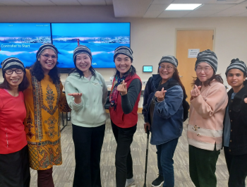 Group photo of participants who made slouchy hats at the FabMo program