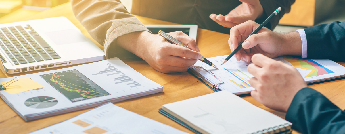 Photo of businesspeople working on a report