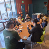Teens and staff playing uno