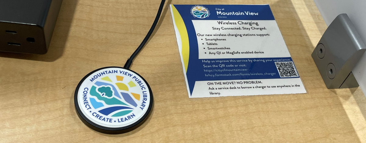 Photo of a wireless charger in a study carrel on the second floor of the Library