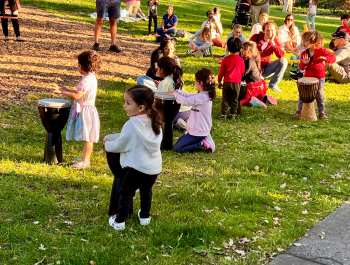Photo of children playing drums at the Summer Reading Program Kick-Off