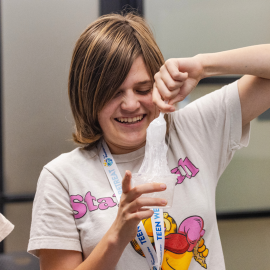 Teen playing with slime.