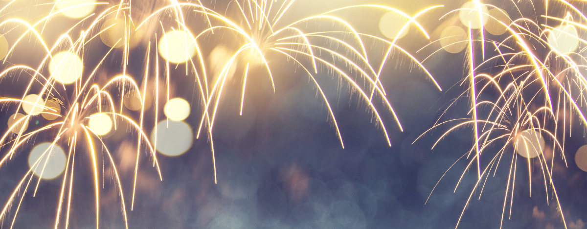 Graphic of fireworks and sparkles