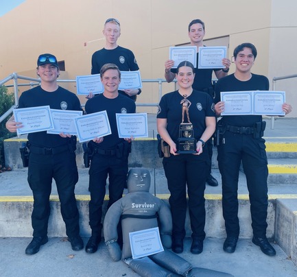 Photo of Explorers showing off their awards