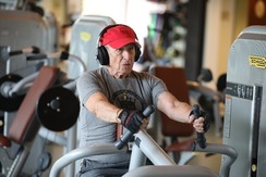 Photo of man using equipment at the OASIS fitness center