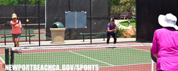 Photo of a group of women playing pickleball