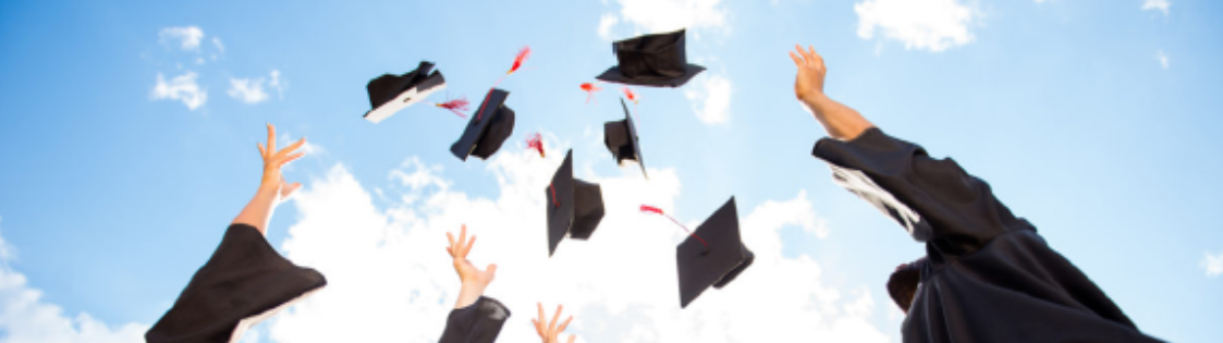 Image of graduation caps and diplomas