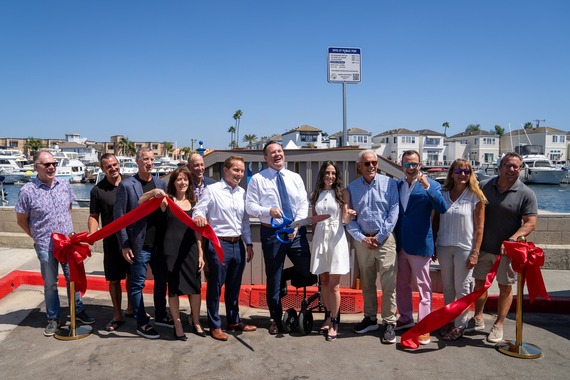 Council members cut the ribbon on the new harbor dock