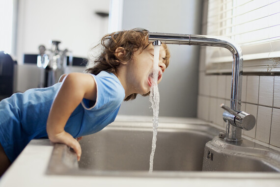 Boy drinking water