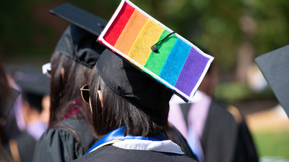Student with rainbow graduation cap 