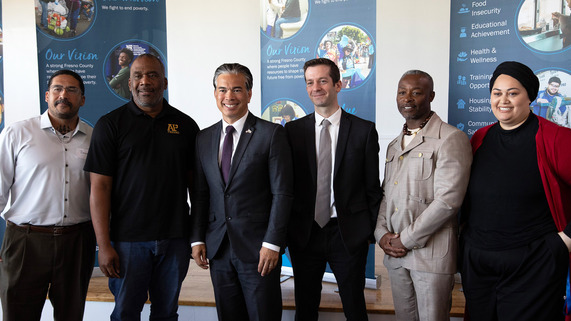 Picture of Attorney General Bonta and local Fresno partners standing together 
