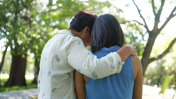Picture of family hugging