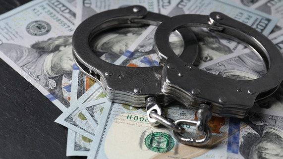 Handcuffs on money