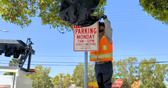 Street sweeping signs