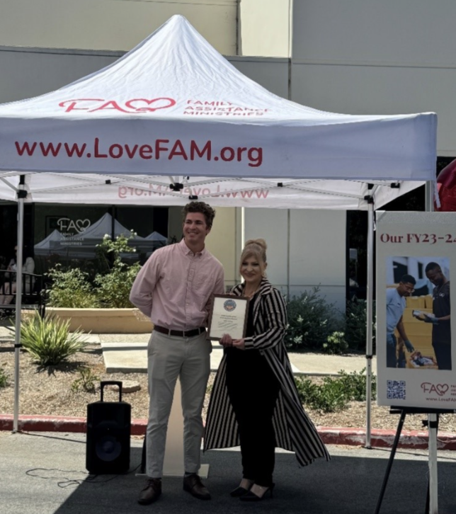 tyler mosher ribbon cutting