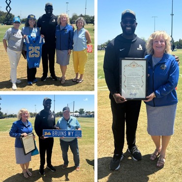 Presenting UCLA Football Head Coach DeShaun Foster with a proclamation and gift bag! Go Bruins! 